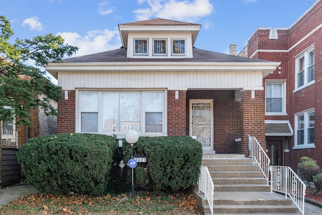 bungalow with brick siding