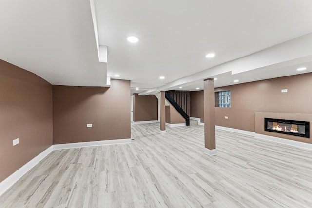 basement with light wood-type flooring