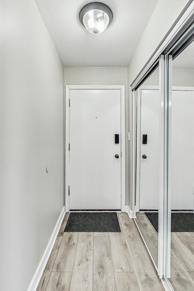 doorway to outside featuring light hardwood / wood-style floors