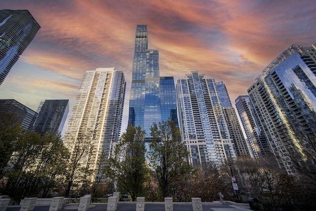 view of outdoor building at dusk