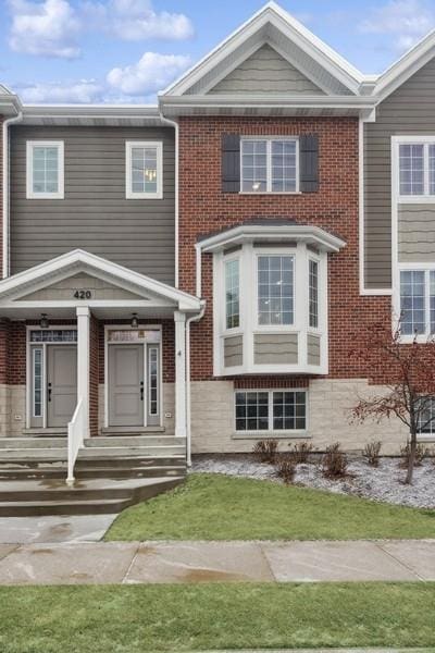 view of front of home with a front yard