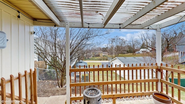 wooden deck with a pergola