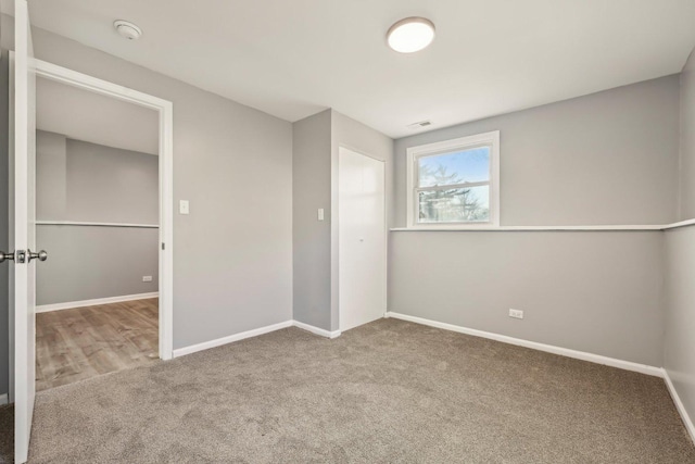 view of carpeted spare room