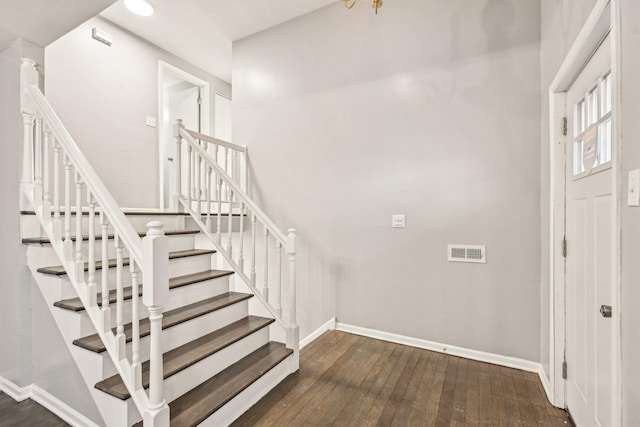 entryway featuring dark wood-type flooring