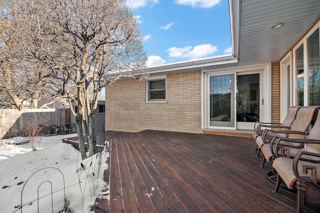 view of snow covered deck