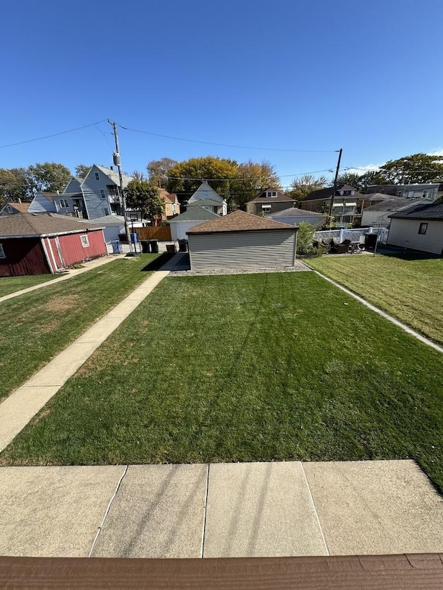 view of yard featuring a residential view