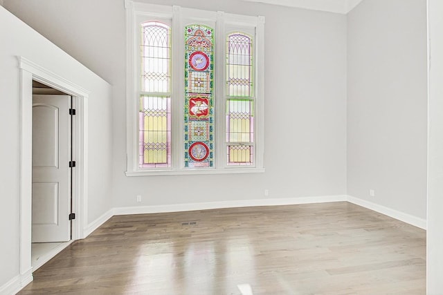 unfurnished room featuring light hardwood / wood-style flooring