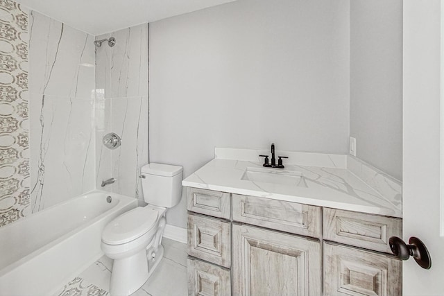 full bathroom featuring toilet, vanity, and tiled shower / bath