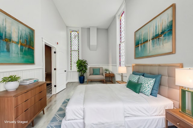 bedroom with light wood-type flooring