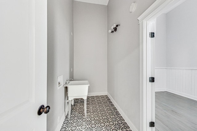 bathroom with hardwood / wood-style floors