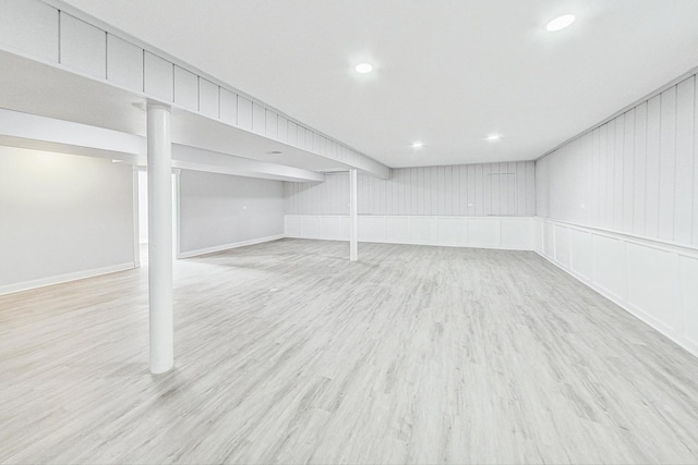 basement with light wood-type flooring