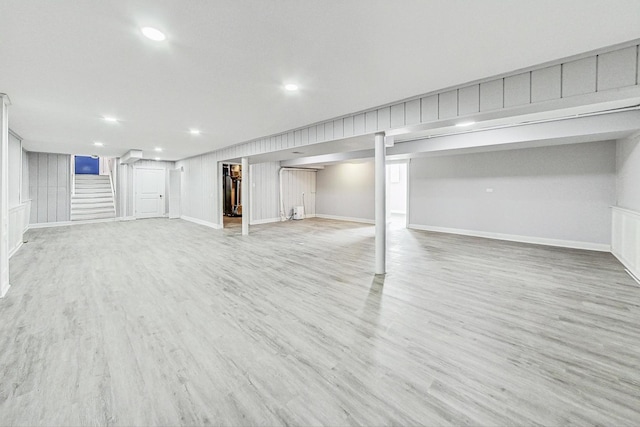 basement featuring light wood-type flooring