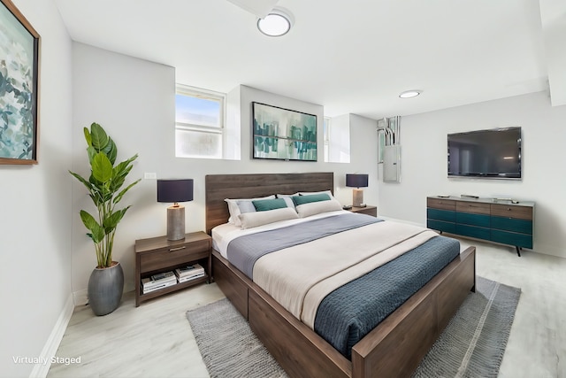 bedroom featuring light wood-type flooring