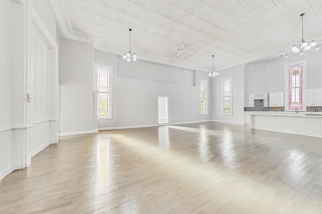 unfurnished living room featuring light hardwood / wood-style flooring