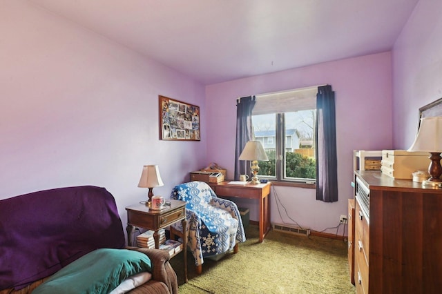 living area with light colored carpet