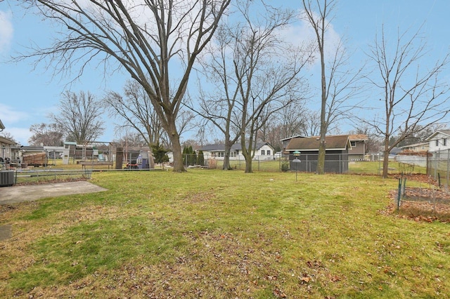 view of yard with central AC unit