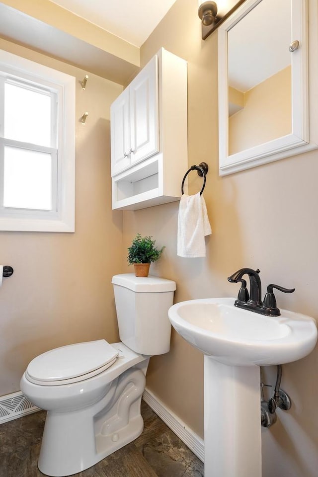 bathroom featuring toilet