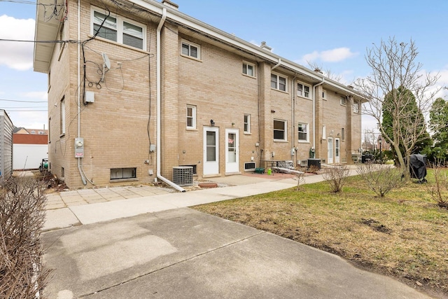 back of property with central air condition unit