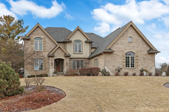 view of front of home with a front yard