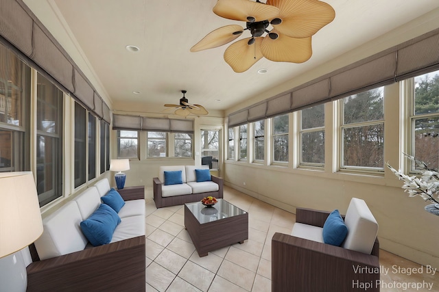 sunroom with ceiling fan