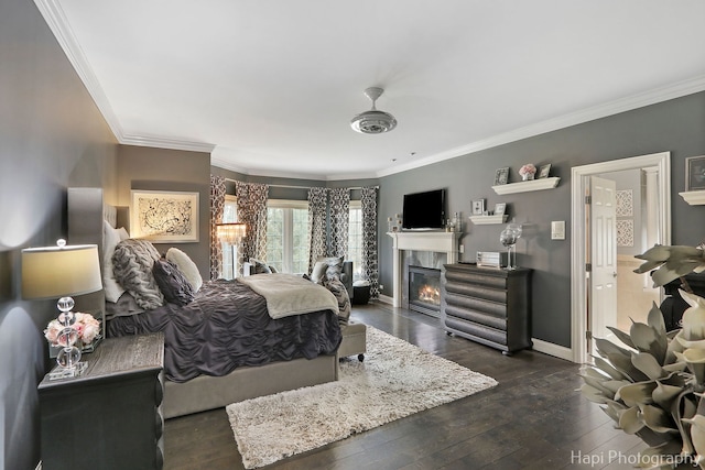 bedroom with ornamental molding and dark wood-type flooring