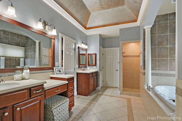 bathroom featuring ornamental molding, vanity, a tray ceiling, independent shower and bath, and tile patterned flooring