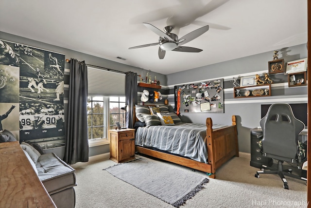 bedroom with light colored carpet and ceiling fan