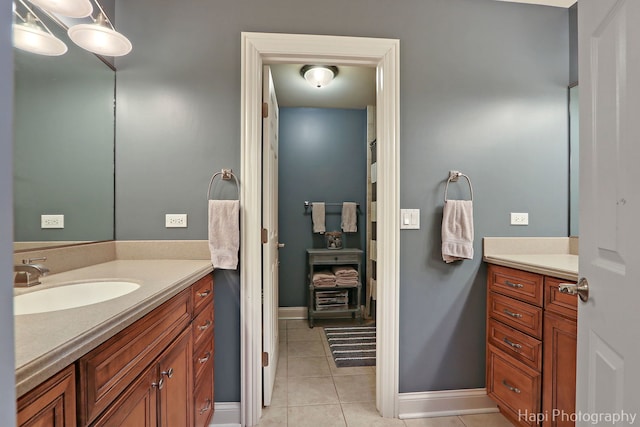 bathroom with vanity and tile patterned floors