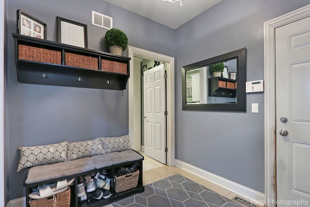 mudroom with tile patterned flooring