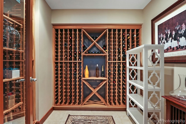 wine cellar featuring light tile patterned floors