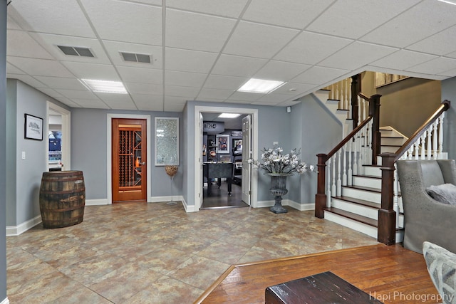 entryway with a paneled ceiling