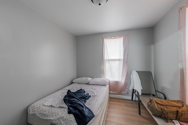 bedroom featuring light hardwood / wood-style floors