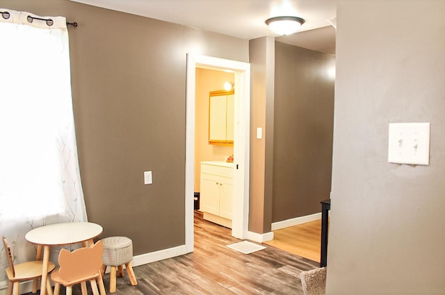 dining room with hardwood / wood-style flooring