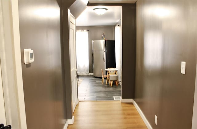 hallway featuring light hardwood / wood-style floors