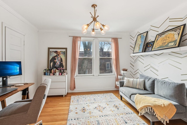 living room with wood-type flooring, a notable chandelier, and crown molding