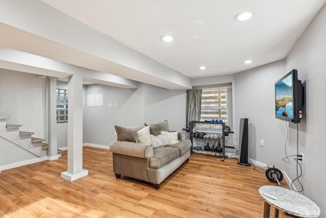 living room with light hardwood / wood-style flooring