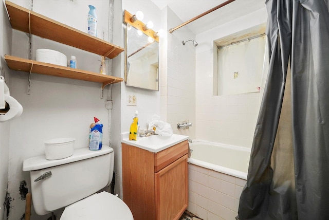 full bathroom with shower / tub combo, vanity, and toilet