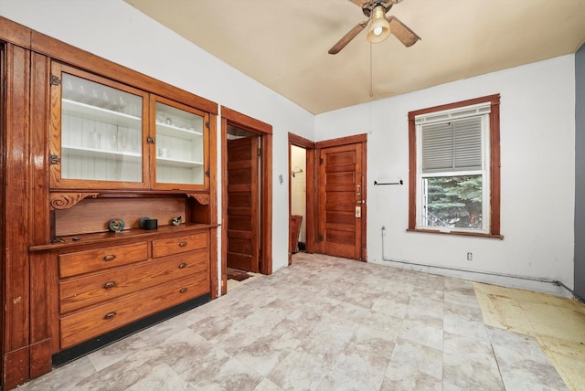 empty room featuring ceiling fan