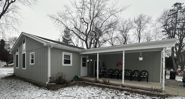 view of snow covered property