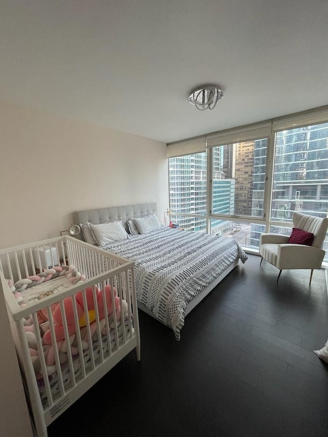 bedroom featuring hardwood / wood-style flooring