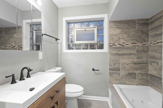 full bathroom with vanity, toilet, and tiled shower / bath