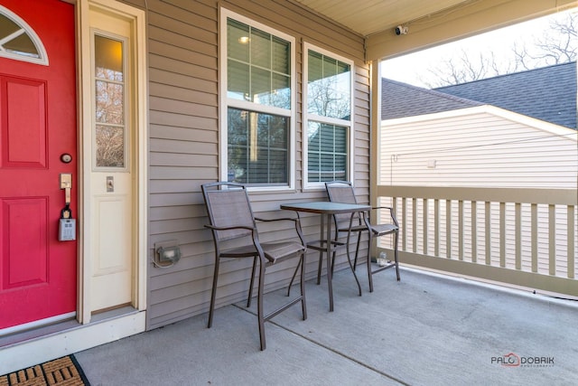 entrance to property with a porch