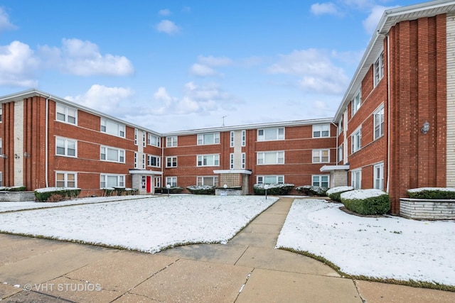 view of snow covered property