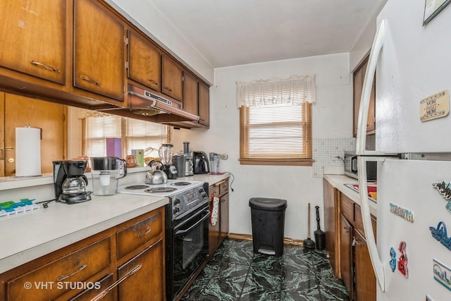 kitchen featuring black electric range