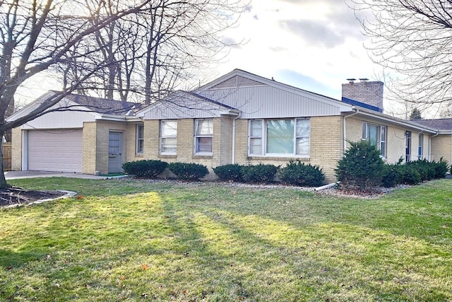 ranch-style home with a front lawn and a garage