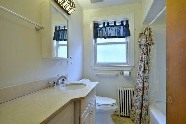 full bathroom with vanity, shower / bath combo, radiator, tile patterned floors, and toilet