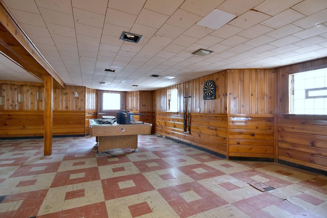 unfurnished office with wooden walls