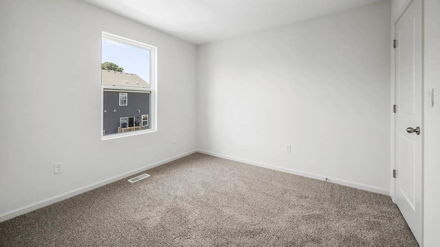 view of carpeted spare room