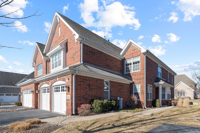 view of property exterior with a garage