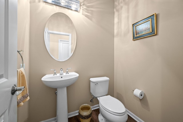 bathroom with sink and toilet